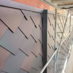 Stainless steel diamond tile panels, flashing & trim.